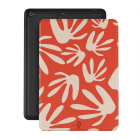 iPad cover featuring an orange and white floral pattern and a a durable design and precise cutouts for easy access to all ports and buttons