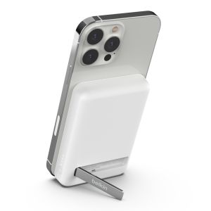 display of powerbank attached to iPhone with stand to hold up the smartphone 