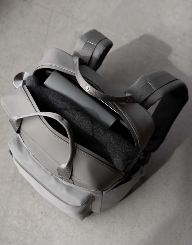 Person carrying laptop backpack