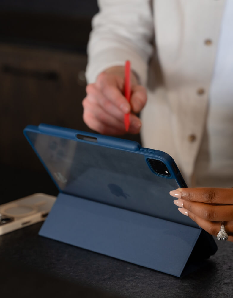 Person using iPad stand