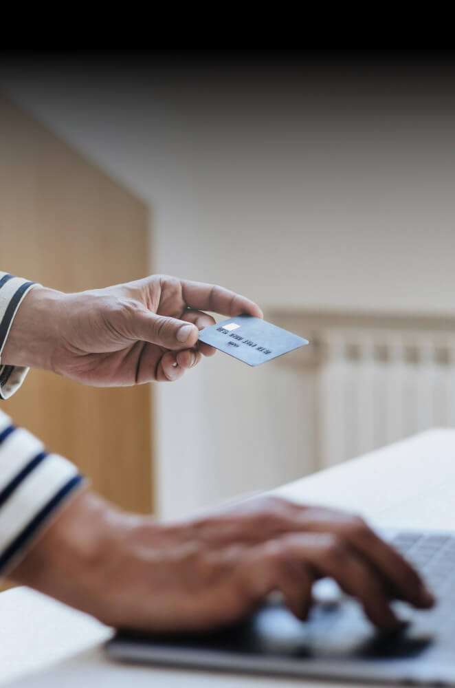 Hand holding bank card