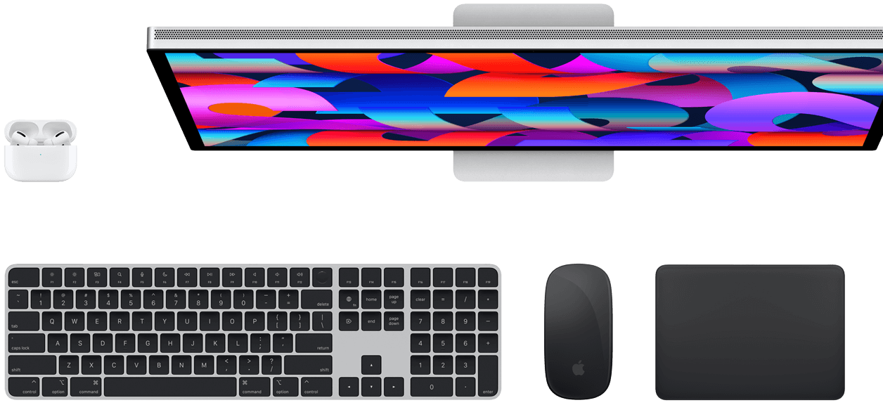 Top view of AirPods, Studio Display, Magic Keyboard, Magic Mouse, and Magic Trackpad