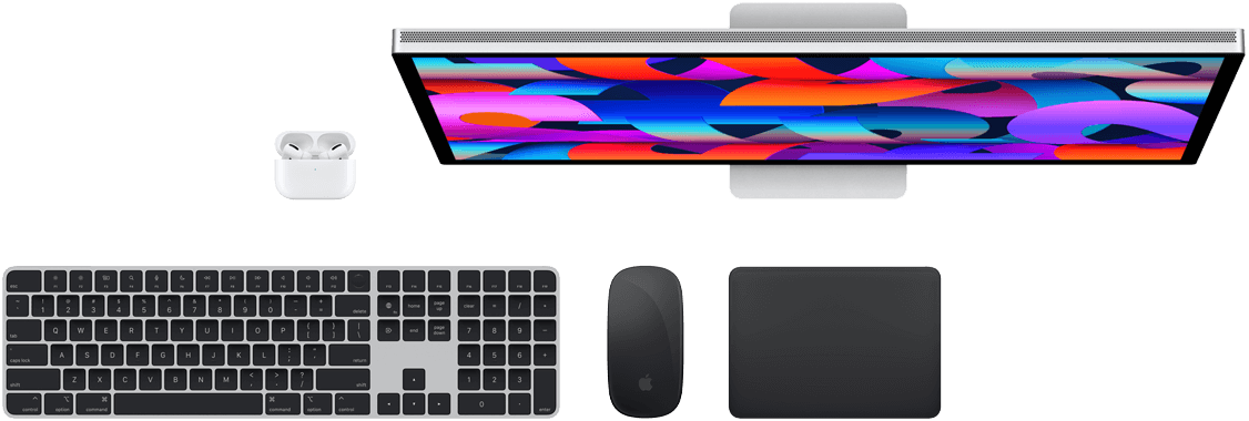 Top view of AirPods, Studio Display, Magic Keyboard, Magic Mouse, and Magic Trackpad