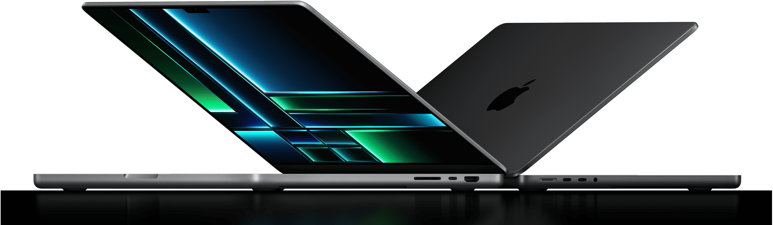 Side view of two MacBook Pros that are halfway open.