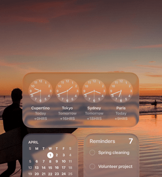 Liquid Glass Clock, Calendar, Reminders and Weather widgets on macOS Tahoe screen over a scene of a surfer walking on the beach at sunset