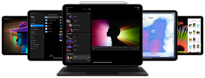 Front view of iPad Pro with Smart Keyboard Folio and Apple Pencil attached displaying Keynote for iPad app along with other iPad devices behind it