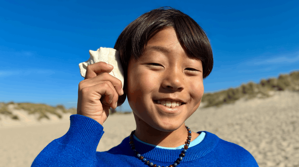 Photo taken with 48MP Fusion camera, next-generation portraits feature in use, focused on a person's face